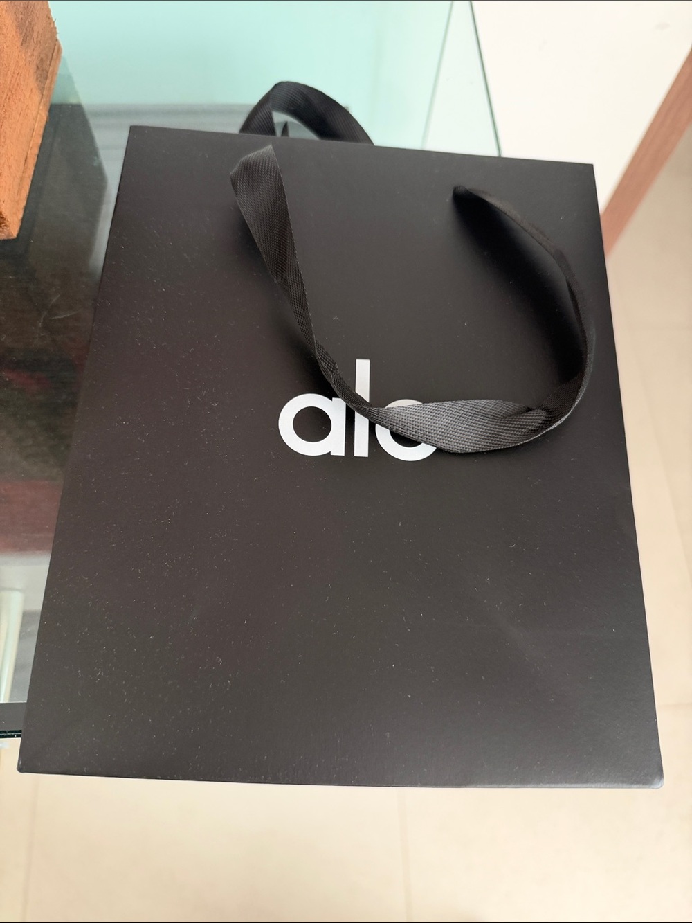 ALO Yoga Black paper Bag with Ribbon Handles